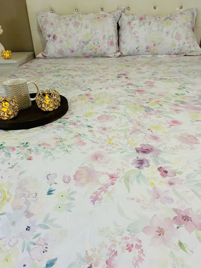 Reversible_Quilted_Bedcover_2_Yellow&PinkFlowers.webp